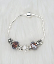 Load image into Gallery viewer, Handmade Clear &amp; Brown Snake Charm Bracelets
